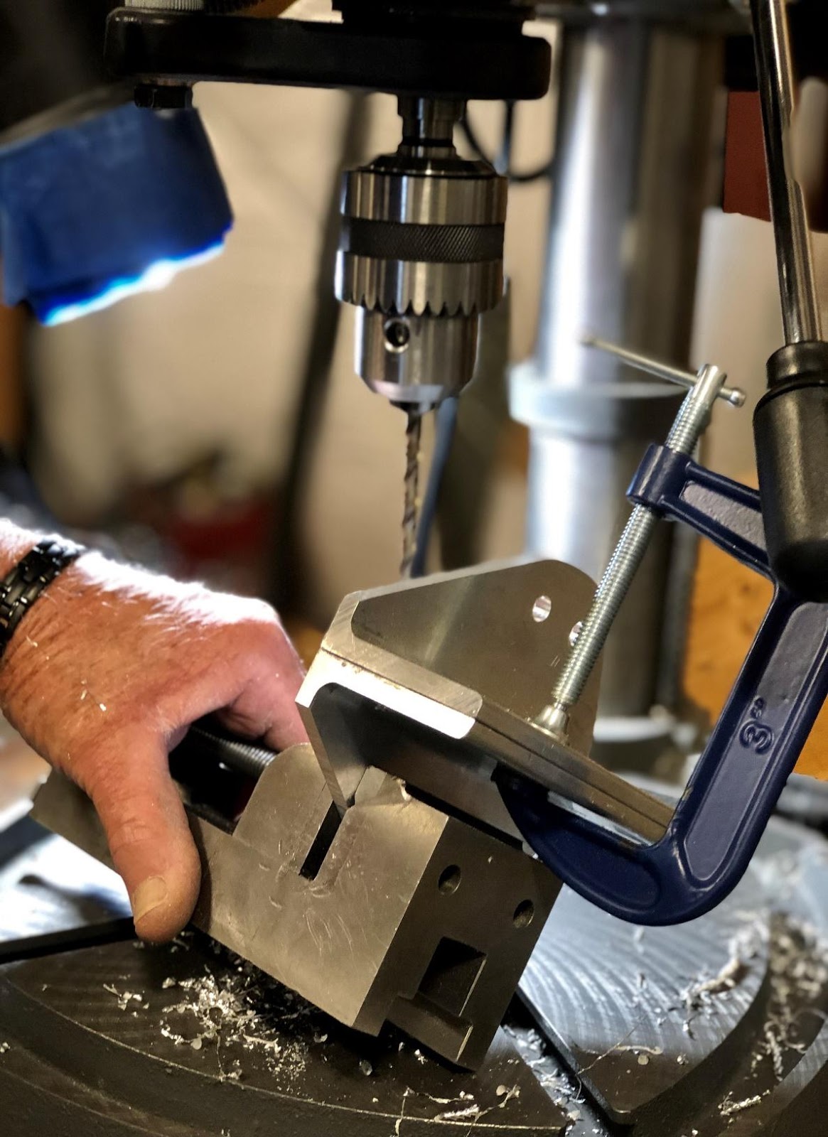 image16 A man drilling alignment holes into metal brackets