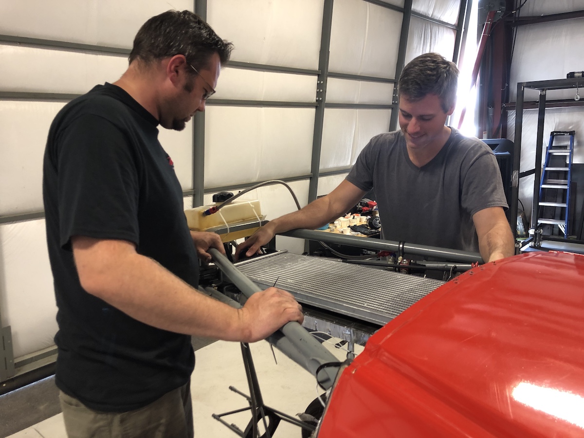 two engineers reviewing a new intercooler