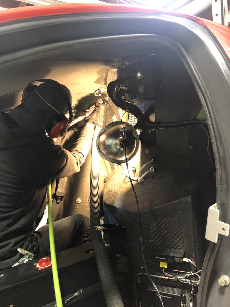 Bart modifying rear fire wall & cabin interior