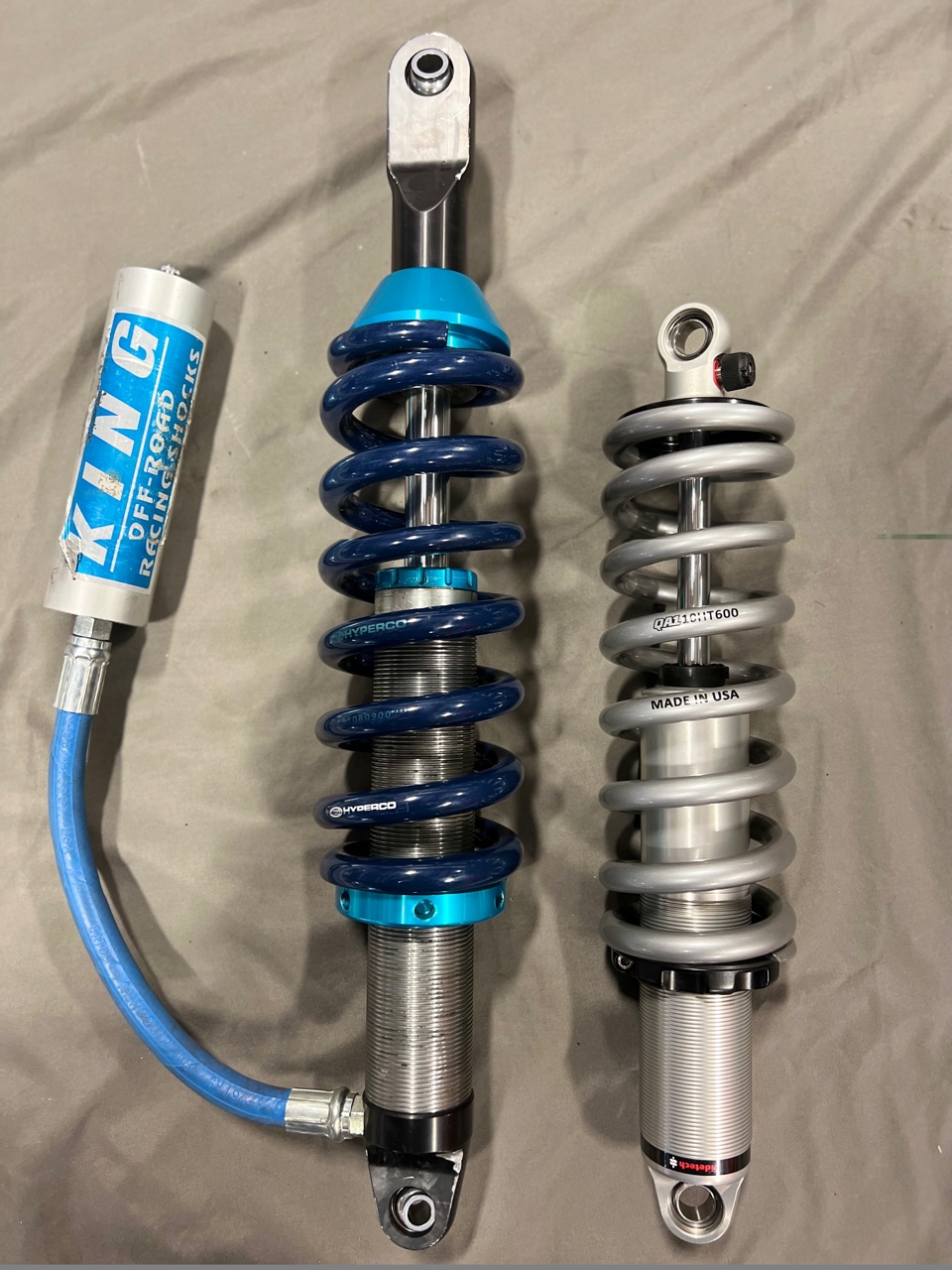 old (blue) and new (grey) shock absorbers