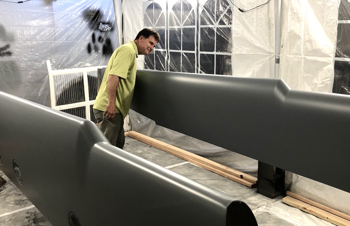 checking the dark grey wings in paint booth 6.20.22 checking the dark grey wings in paint booth